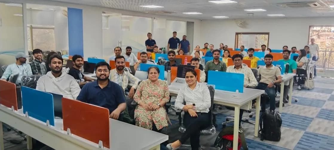 The Nirmitee team together in their workspace